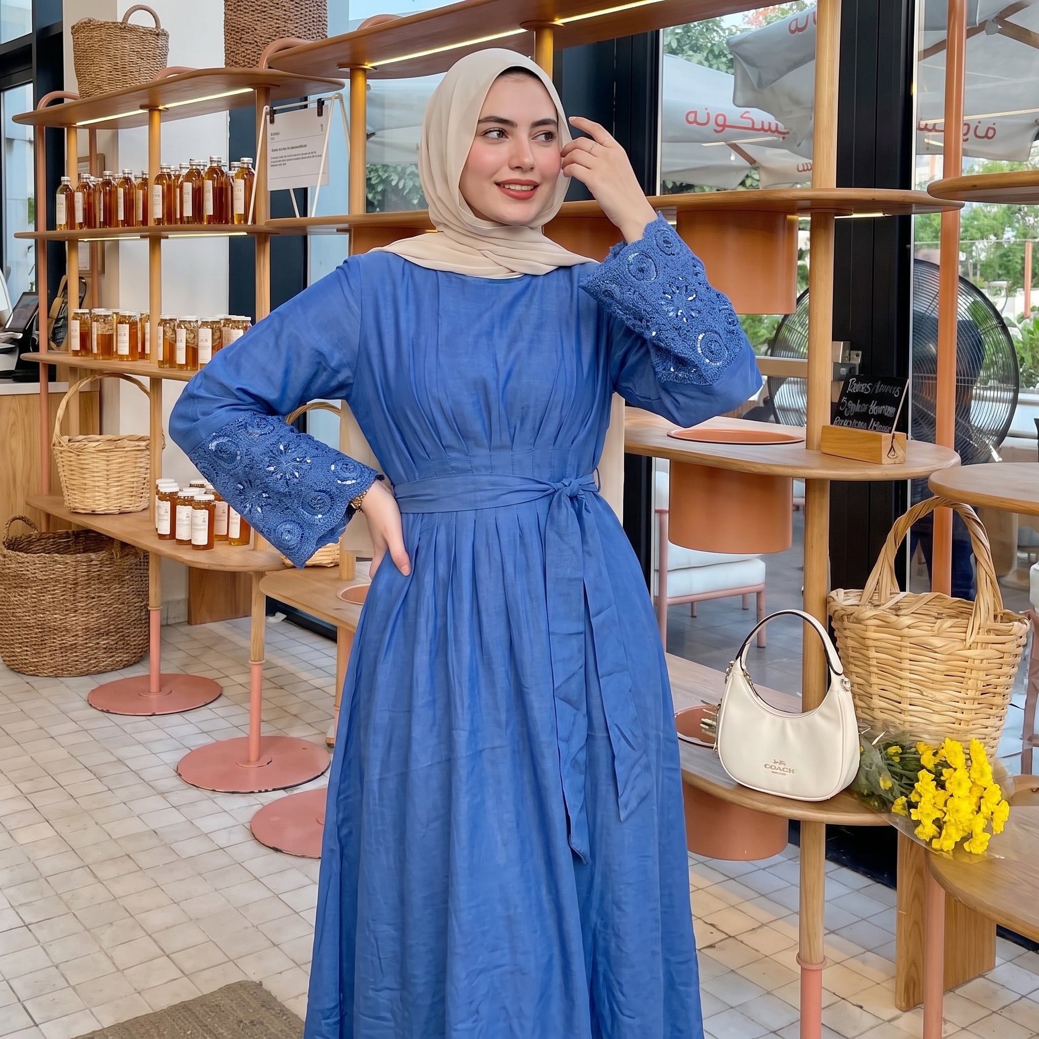 Model wearing Blue Embroidered Linen Dress | عارضة ترتدي فستان كتان أزرق مطرز – view 2 | لقطة 2
