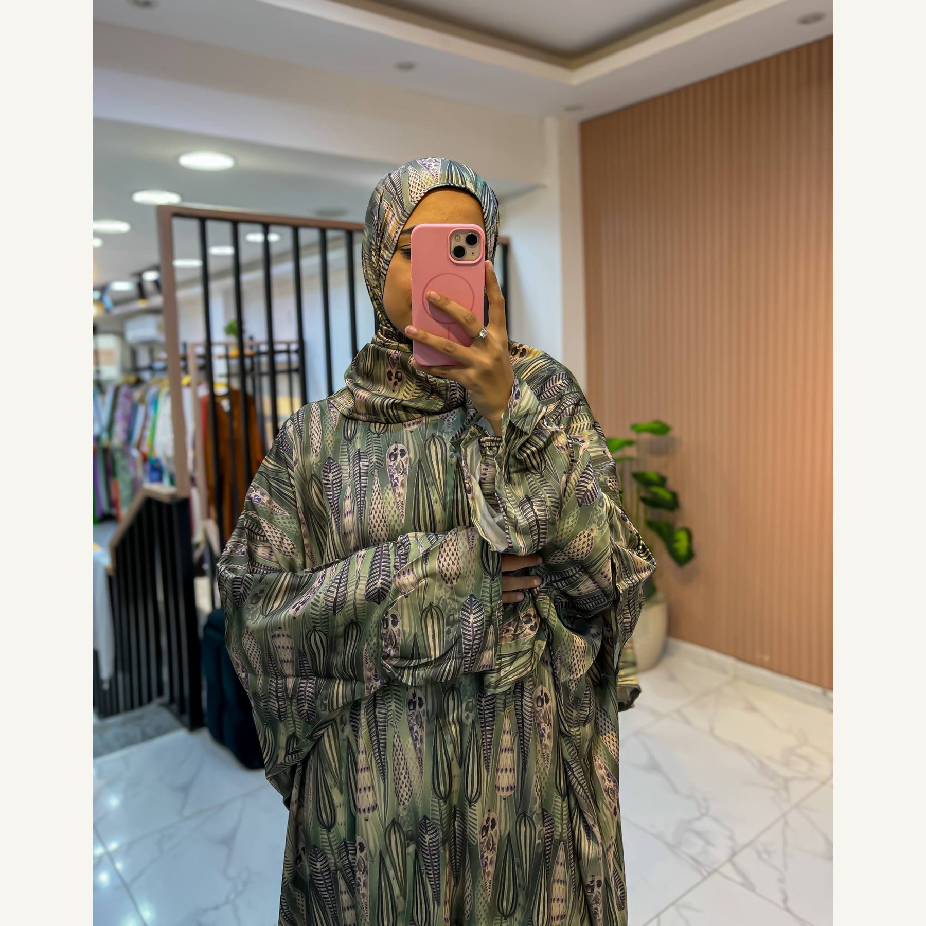 إسدال ستان ريش زيتي بطرحة متصلة | Olive Feather Satin Isdal with attached hijab